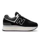 NEW BALANCE 574+ BLACK AND WHITE SNEAKERS